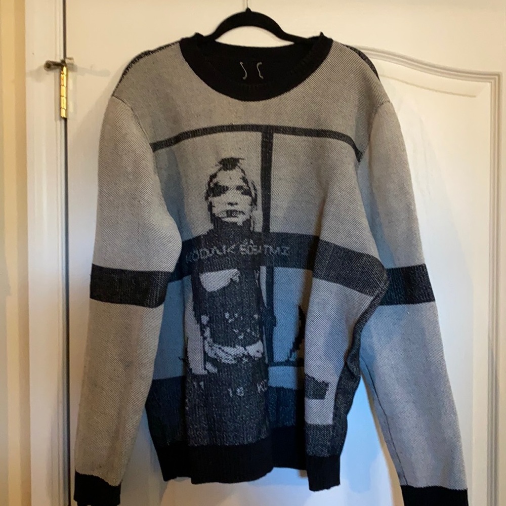 Open ceremony sweater